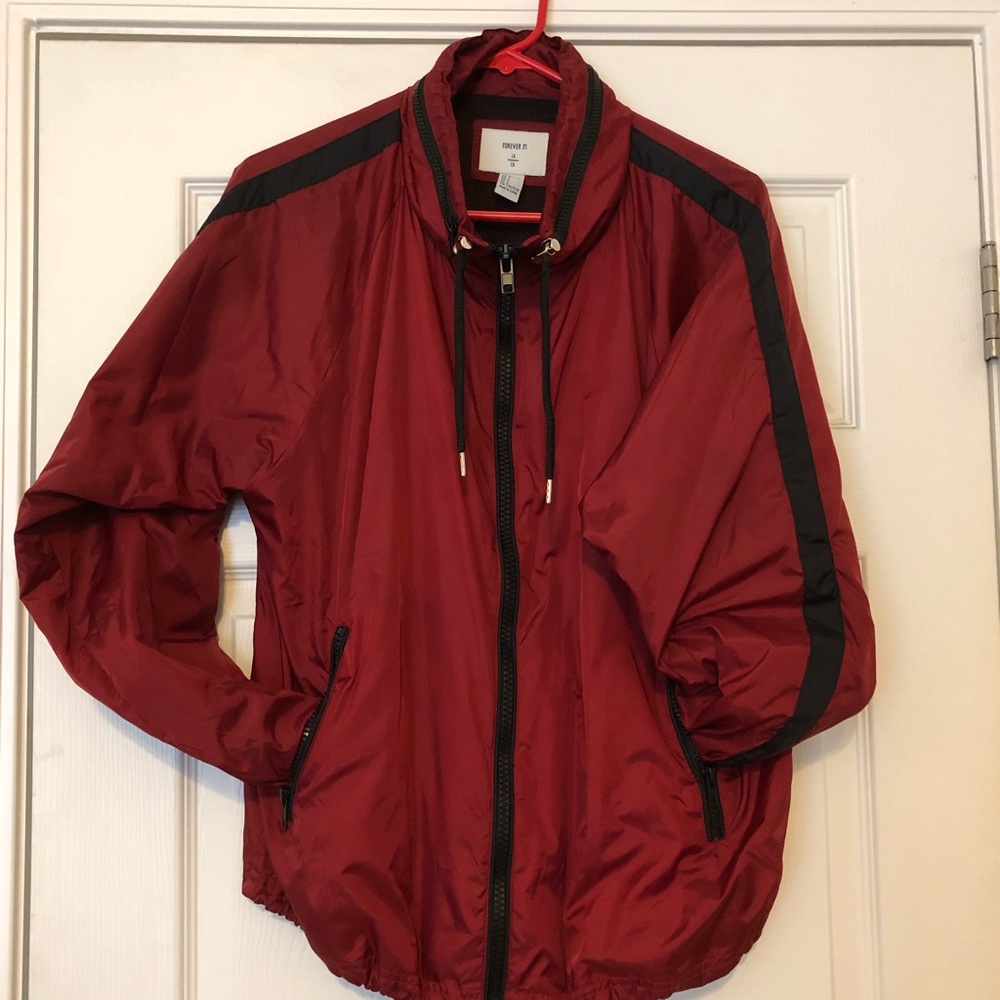 A red windbreaker